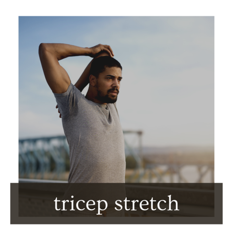 Runner reaching one arm overhead and behind the neck, using the other hand to press the elbow down for a triceps stretch